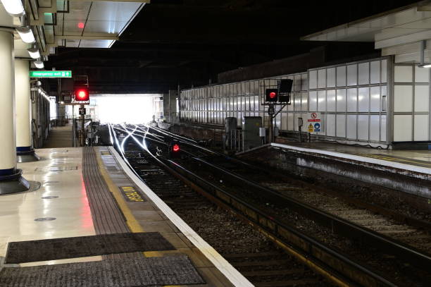 istock Looking out from the platform to the train exit of a London railway station. 1351257874