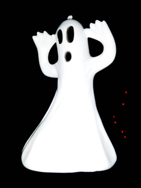 istock traditional toy ghost floating in the dark 1351259165