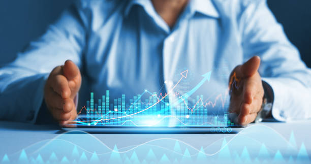 istock Businesswoman using tablet with digital statistics.Development and growth of  company and revenues.Analysing banking and investment.Business development to success,profit and growing growth plan. 1351260449