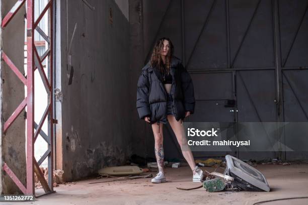 Young Woman In Black Down Jacket Stock Photo - Download Image Now - Winter, Oversized Object, Women