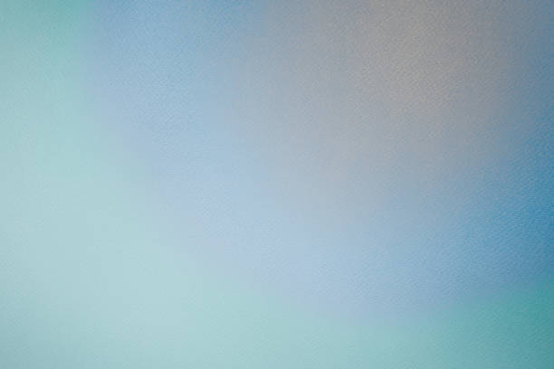 istock Aquarel paper surface with radial peach, blue and green gradient 1351263119