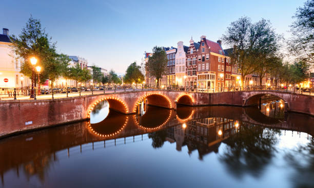 istock Amsterdam in Netherlands at night 1351265531
