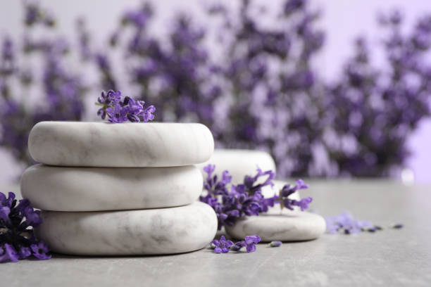 istock Stones, sea salt and lavender flowers on grey table 1351266818