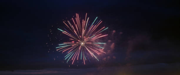 istock Colorful firework with bokeh background. New Year celebration, Abstract holiday background 1351267865