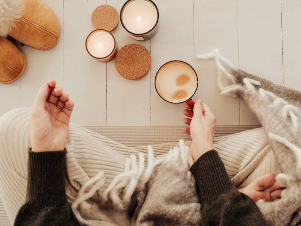 istock Woman indoors meditating drinking coffee and getting some mindfulness time 1351268430