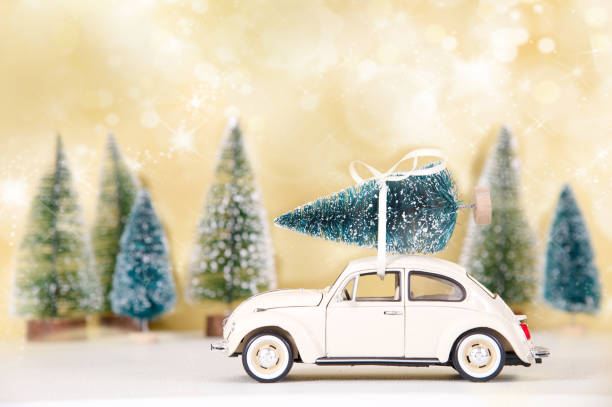 istock Little car with christmas tree 1351271772