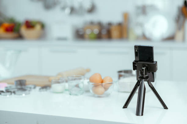 istock Easter table with spring flowers in a sunny April kitchen 1351272247