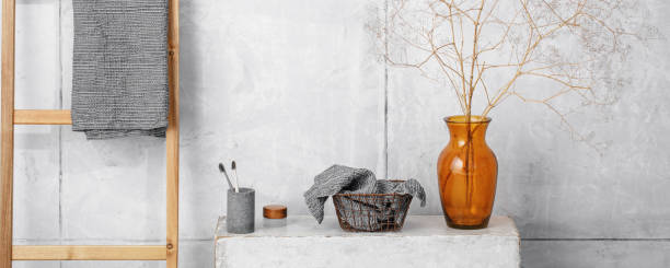 istock Organic waffle linen towels, bamboo toothbrushes, bathroom zero waste accessories in grey shades in contemporary bathroom interior. Daily body care, spa and wellness zero waste bathroom concept 1351273255