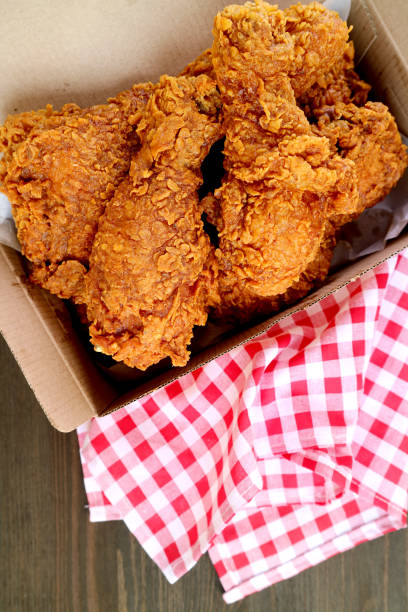 istock A box filed with delectable golden brown crispy fried chickens 1351273455