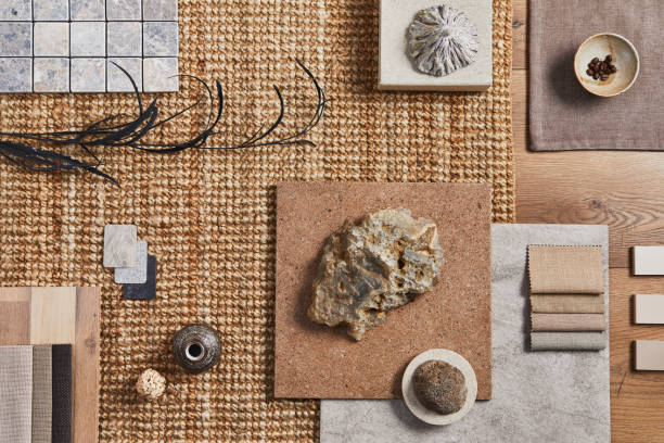 istock Flat lay of creative architect mood board composition with samples of building, orange textile and natural materials and personal accessories. Top view, template. 1351275183