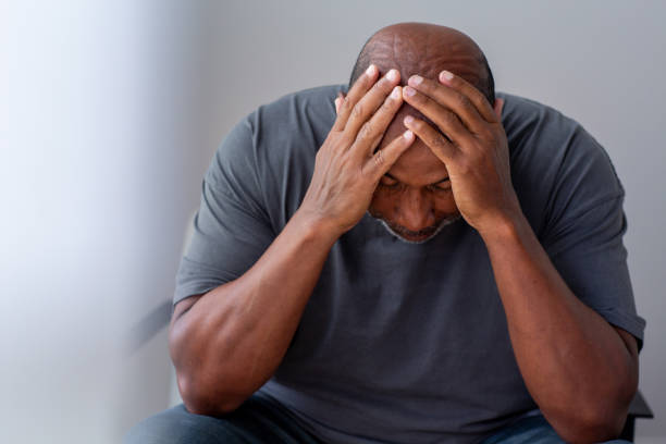 istock Older man not feeling well and having a headache. 1351281651