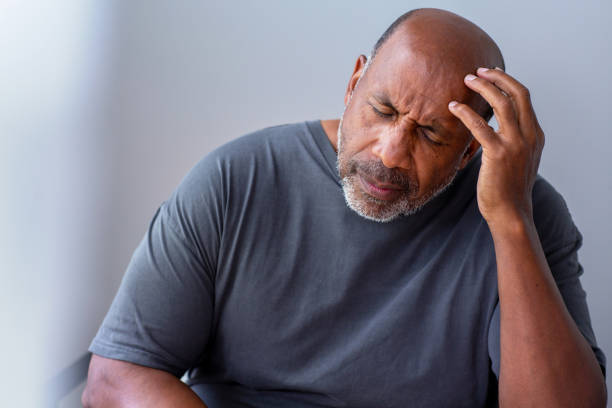 istock Older man not feeling well and having a headache. 1351283674