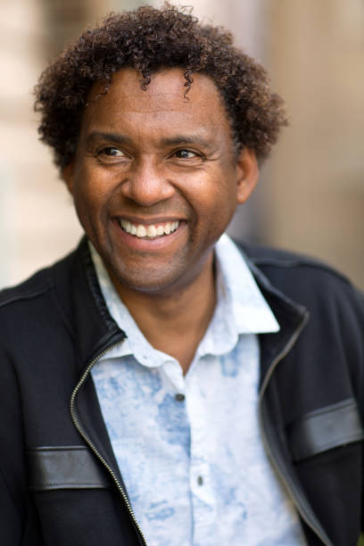 istock Well dressed mature happy African American man. 1351285171