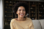 istock Happy young african american woman looking at camera. 1351285381