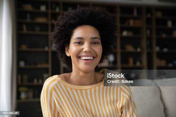 Happy Young African American Woman Looking At Camera Stock Photo - Download Image Now