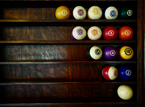Original Bakelite Billiard Balls in a wooden rack