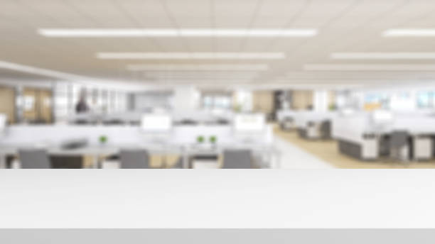 escritorio blanco sobre fondo de oficina borroso - enfoque en primer plano fotografías e imágenes de stock