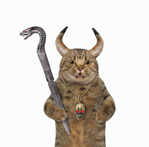 istock Cat horned holds snake knife 1351291355