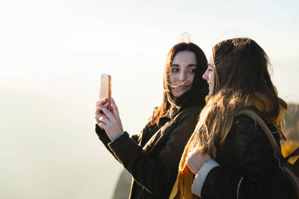 istock Young couple taking a selfie in outdoor 1351292382