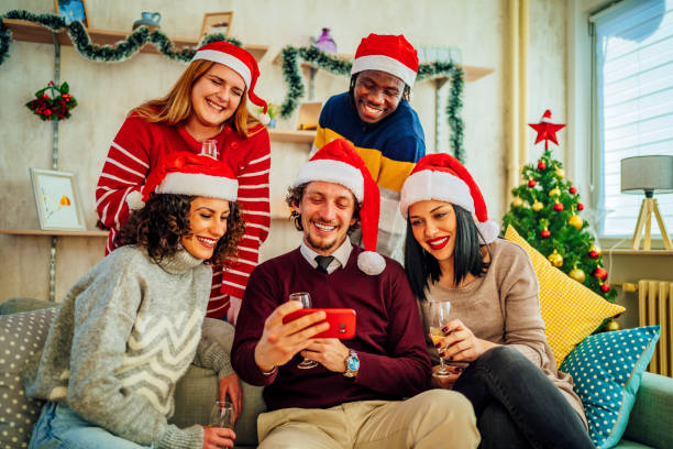 istock Young friends looking at smartphone 1351292637