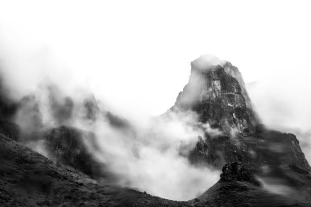 Black and white of Mountain Peaks in the mist stock photo