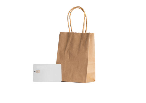 istock Credit card and paper bag on a white background. Mockup. 1351299268