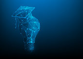 istock light bulb with graduation cap low poly wireframe. concept of learning and education. idea knowledge lamp symbol. isolated on blue dark background. vector illustration digital futuristic style. 1351300424