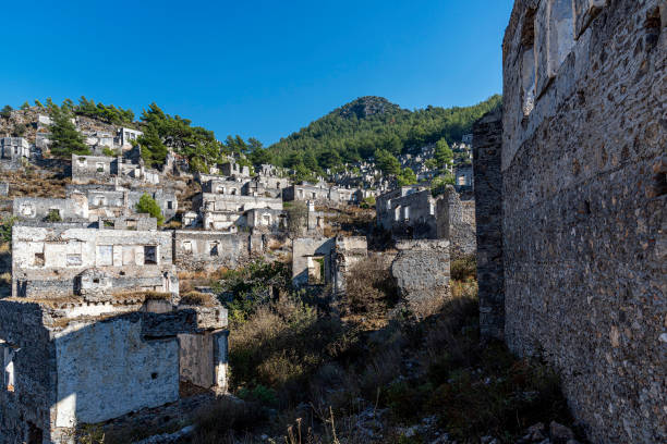 istock Abandoned Kayakoy (Levissi Village, Karmylassos) stone houses 1351301091