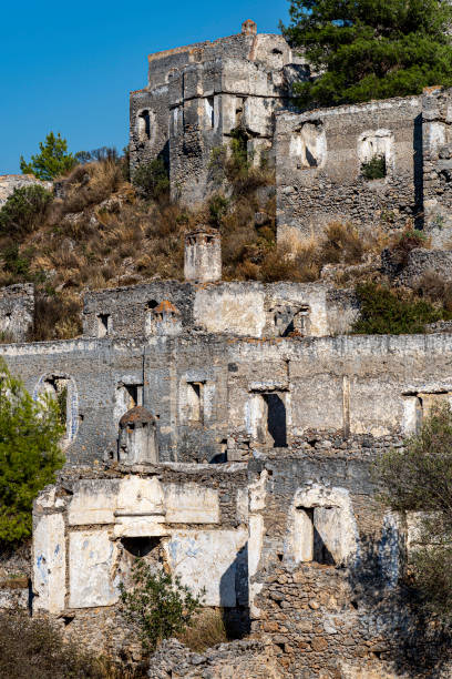 istock Abandoned Kayakoy (Levissi Village, Karmylassos) stone houses 1351302363