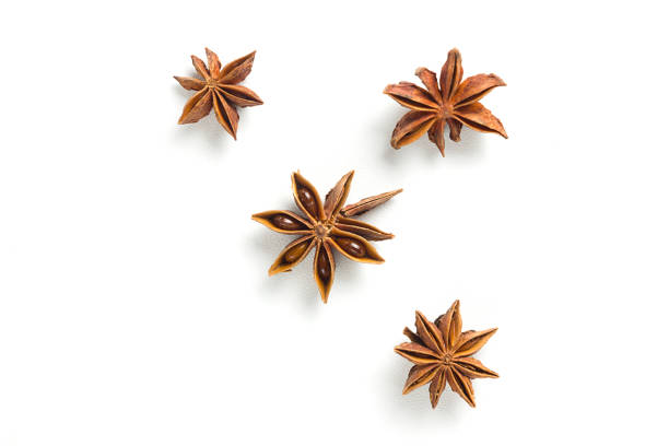 istock Star anise, scattered in a chaotic manner, isolated on white background 1351302679