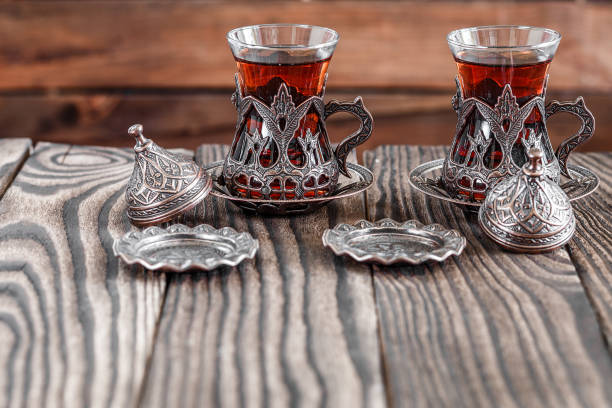 istock Fragrant Turkish tea and Turkish sweets in national dishes 1351302783