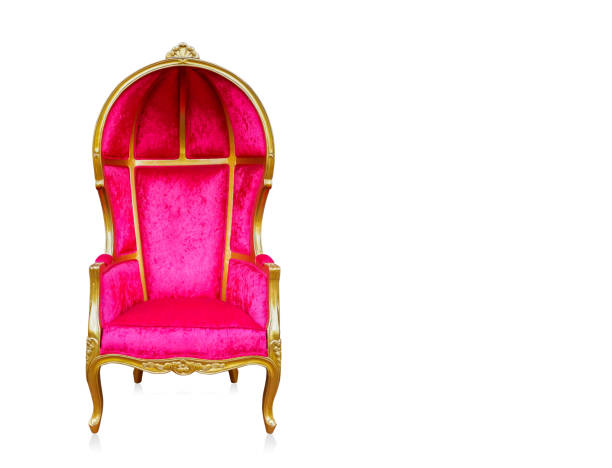 istock front view pink and gold chair on white background, copy space 1351303031