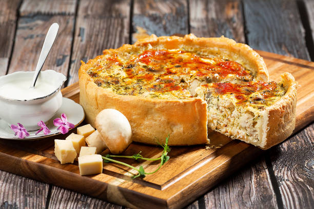 istock French opened pie quiche with chicken on a wood board 1351315424