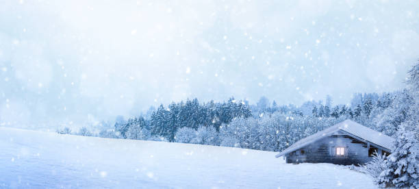istock Snow-covered hut in a winter landscape 1351316449