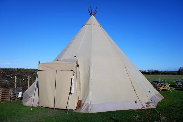 istock Large tipi with entrance awning on rural farmland 1351316632