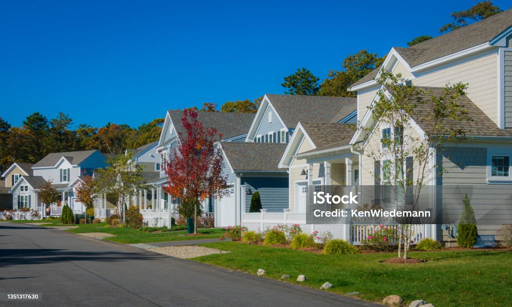 New England Suburbia A well landscaped neighborhood of new homes in southern New England Community Stock Photo