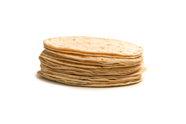 istock Grilled pitta bread isolated on white background. 1351317985