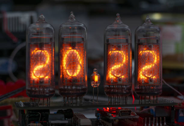 istock retro Nixie lamp indicator clock on dark background 2022 number 1351319219