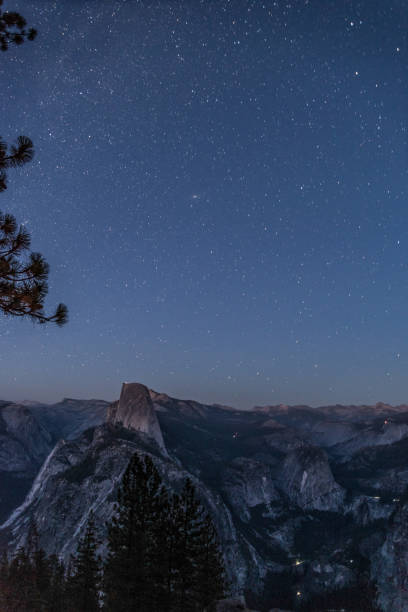 Photo of Scenic night sky above the famous Half Dome mountain, Yosemite NP