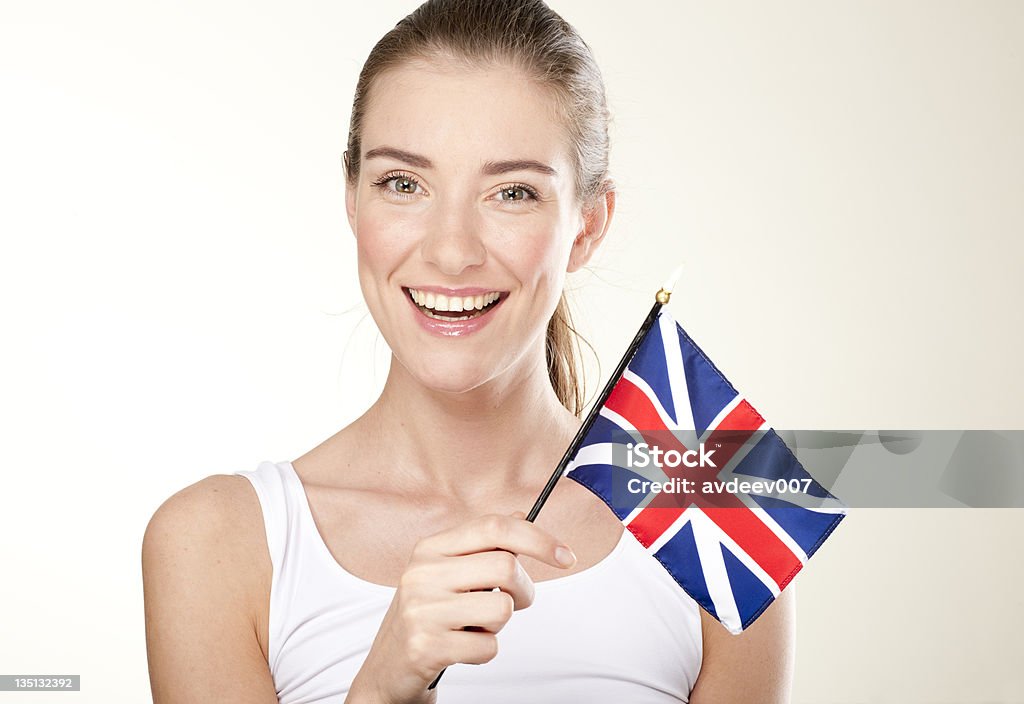 笑顔の若い女性に英国の旗。 - 20-24歳のロイヤリティフリーストックフォト