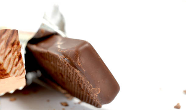 istock Closeup of chocolate bar isolated on white 1351325109