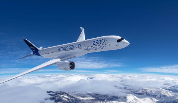 Blue Hydrogen filled H2 Aeroplane flying in the sky - future H2 energy concept. stock photo