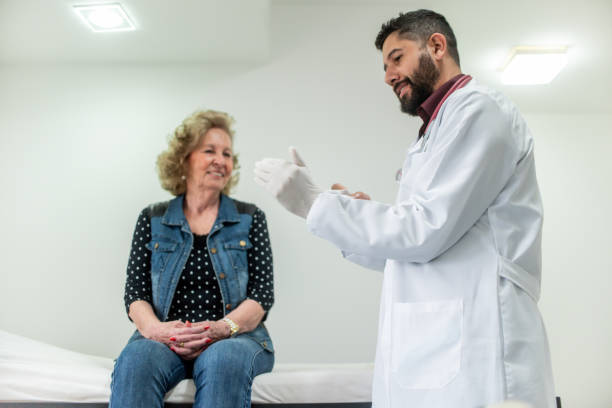 istock Doctor examining senior woman 1351330372