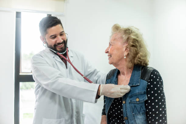 istock Doctor examining senior woman 1351330415