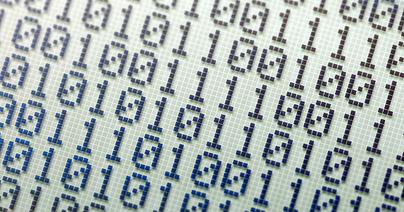 Binary number system, bits, binary numbers on an LCD display abstract wide background, banner, backdrop. Calculator screen macro, closeup, nobody. Math and computer science, electrical engineering