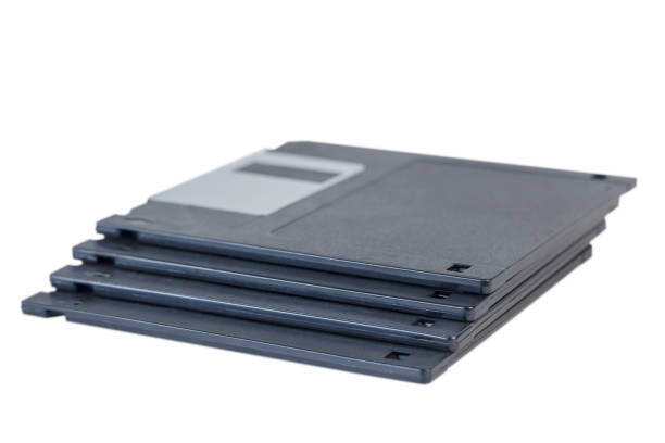 istock four floppy disks on a white background 1351342389