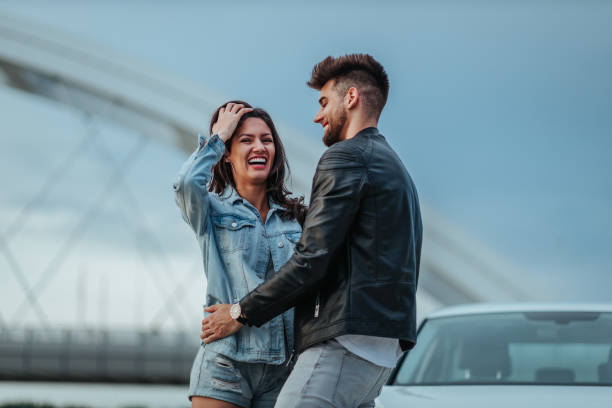 istock Couple enjoying a day at the river coast 1351346632