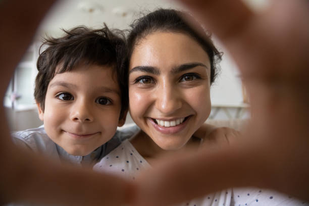 istock Happy bonding asian family having fun at home. 1351347331