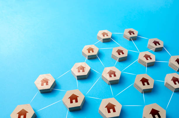 istock Houses connected by lines. Internet service communication. IoT. Utilities. Consolidation of households. Association of residential into a common organization, public service management company. 1351348811