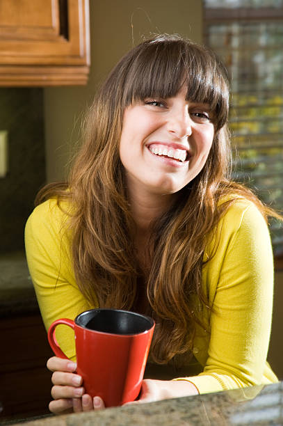 Woman with Coffee Mug stock photo